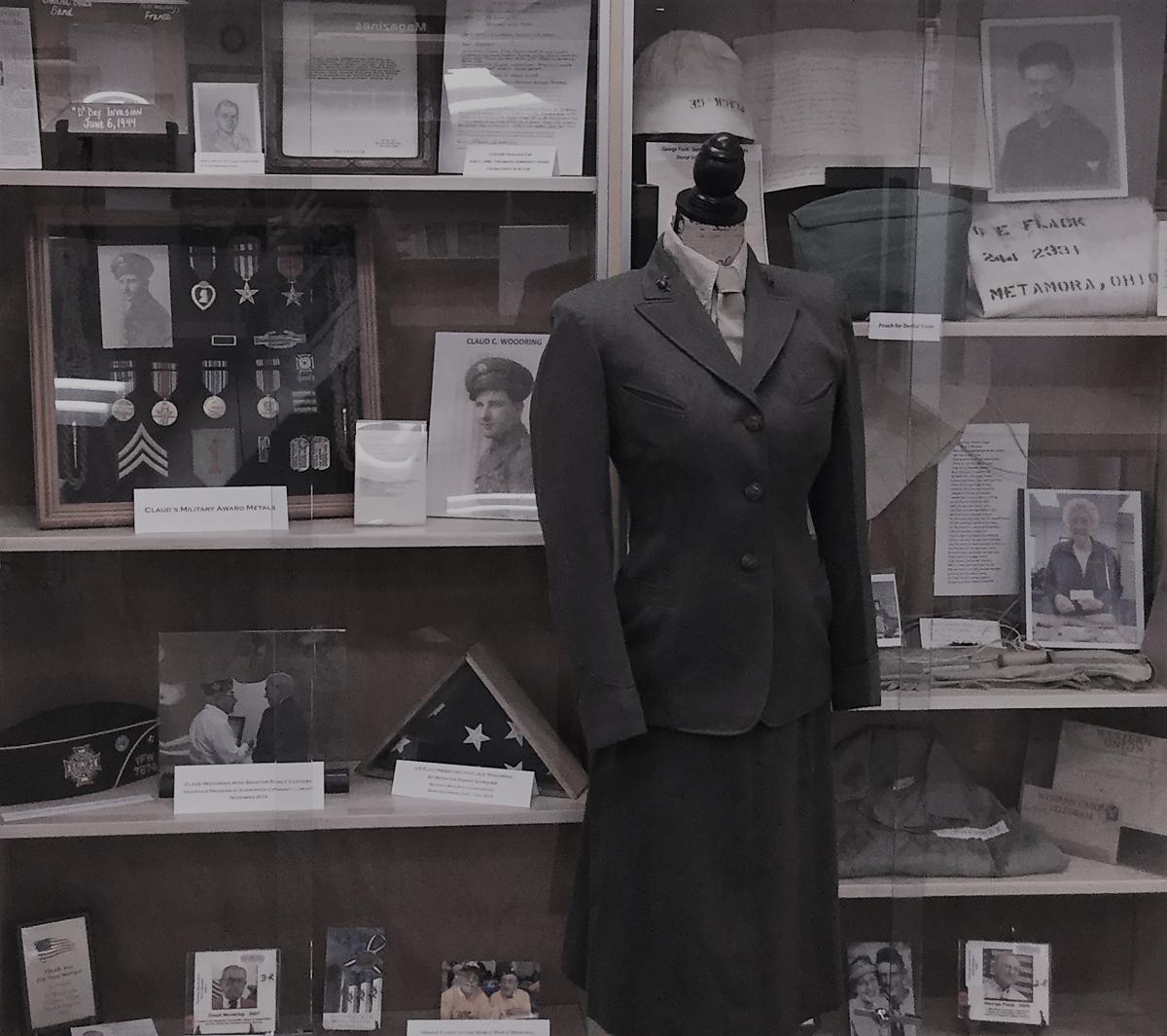 display of WWII artifacts in the library